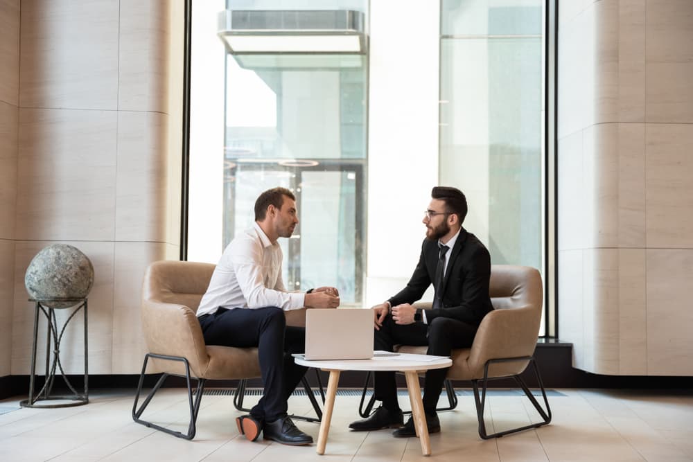 businessmen-discussing-deal