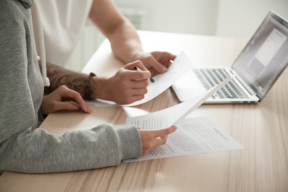 couple reading document