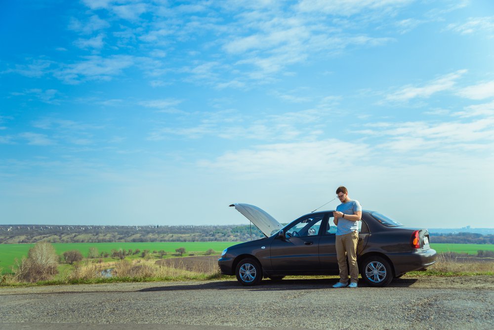 person-in-need-of-roadside-assistance-waiting-for-insurance-company 